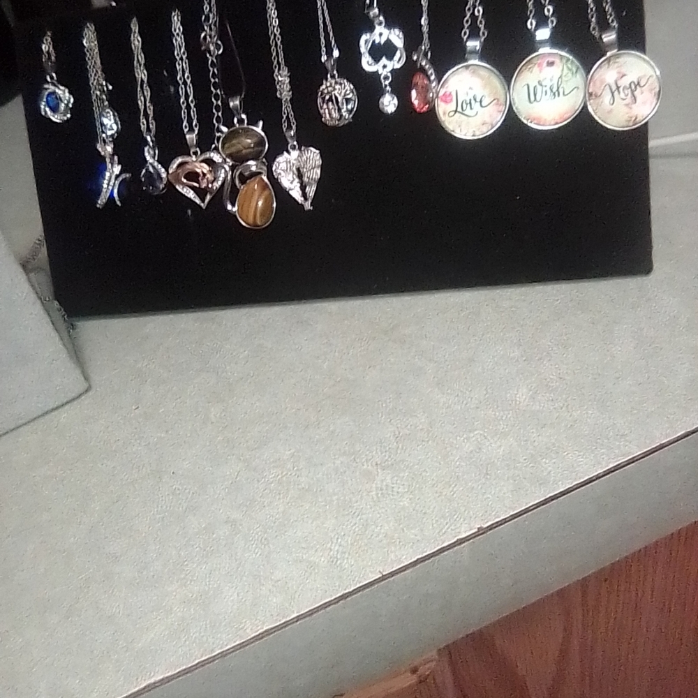 Elegant Silver Pendants Necklace Sets. All $ 400.00